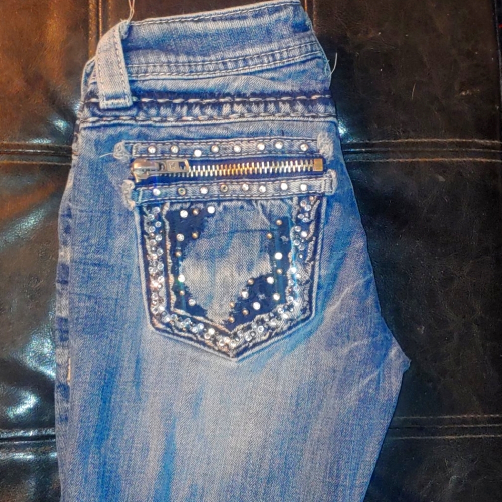 Size 24 Miss me boot cut jeans.